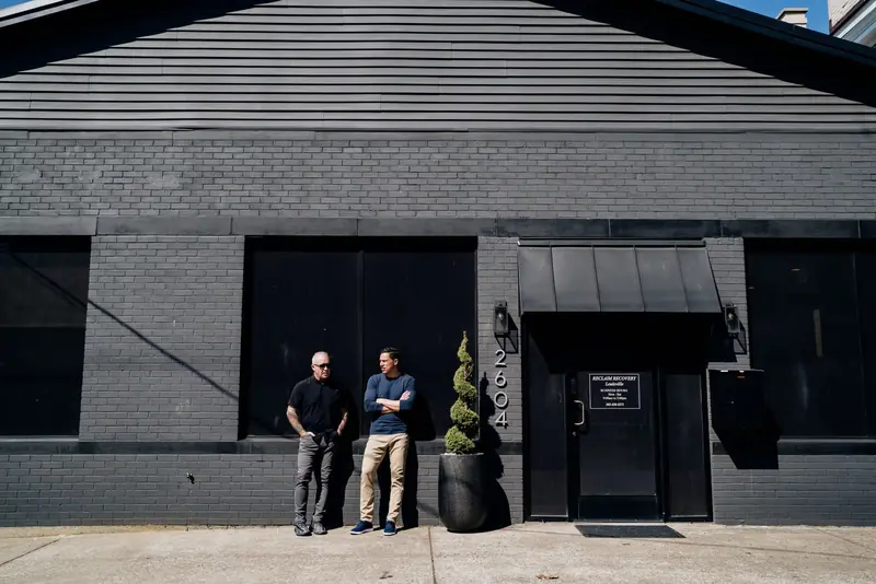 The Reclaim Recovery clinic at 2604 S. Fourth St., Louisville, with two members of the team outside