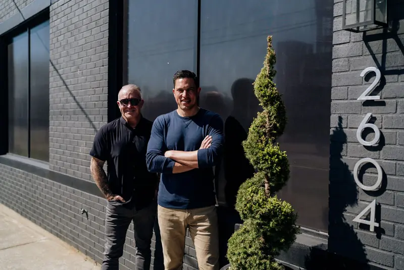 Two members of the Reclaim Recovery team outside the clinic at 2604 S. Fourth St., Louisville