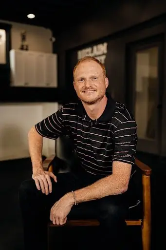 Gary French, Director of Family Services, seated in the Reclaim Recovery clinic